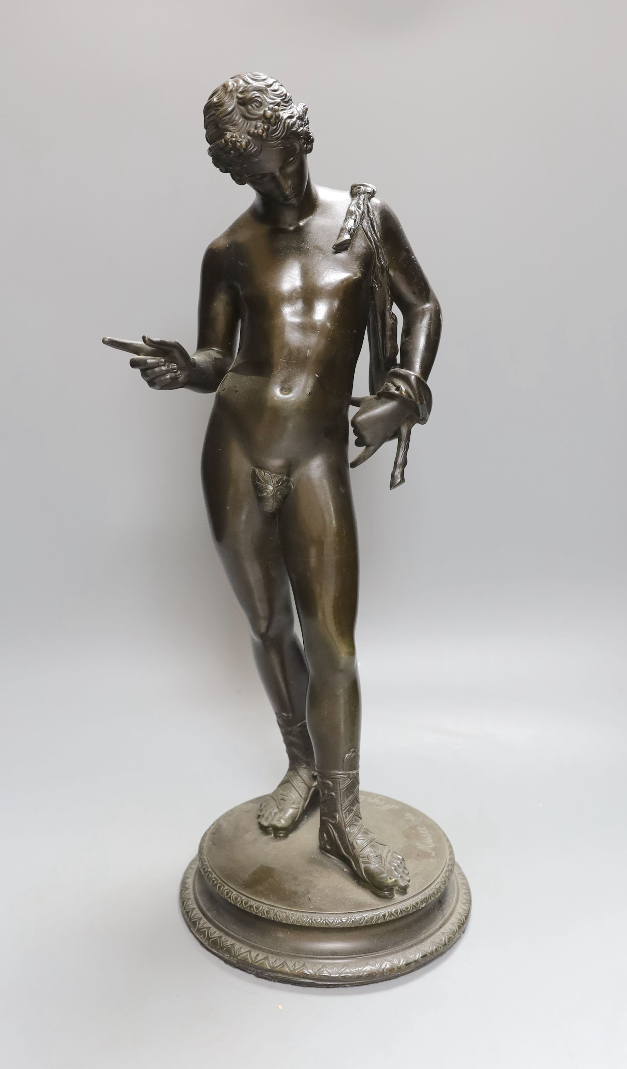 A bronze figure of Narcissus, marked Musee de Naples. 49cm